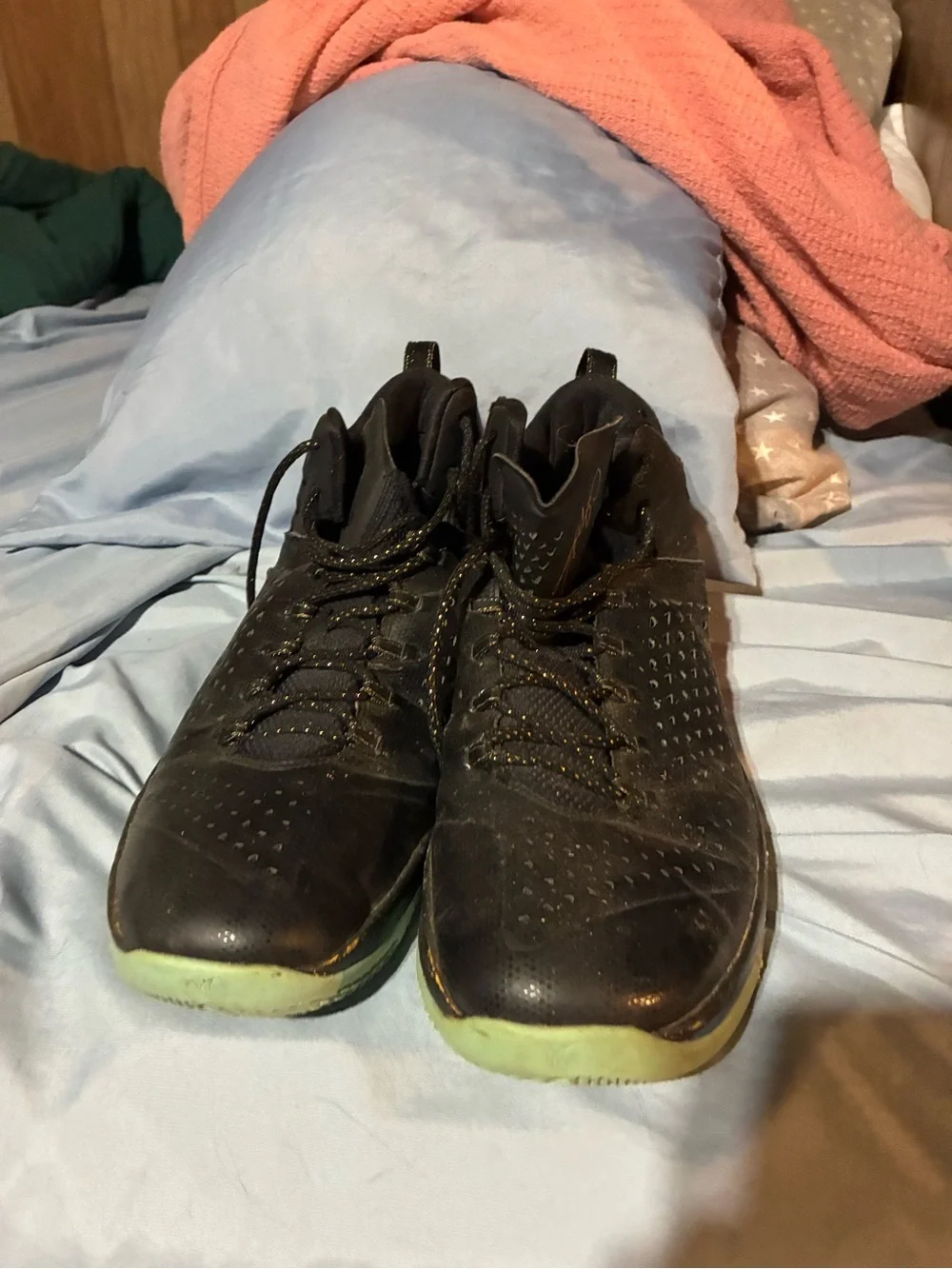 Black Basketball Jordans with Orange Heel Accent